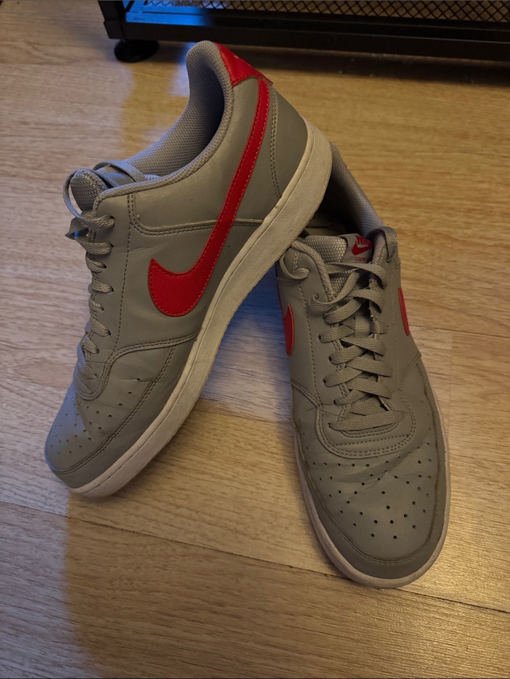 Nike Men’s Grey Sneakers with Red Swoosh Accent